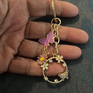 Beautiful Boutique, Gold Keychain, Bag-chain, Inside Front Car Mirror and more.